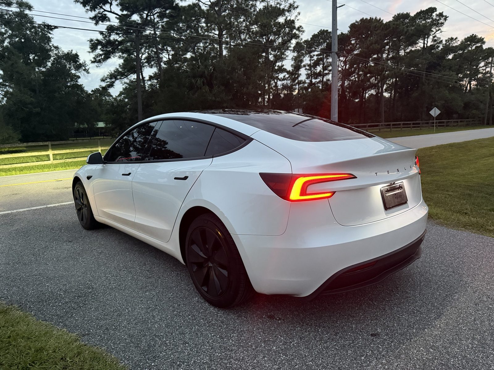 2026 Tesla Model 3 rear three-quarter view